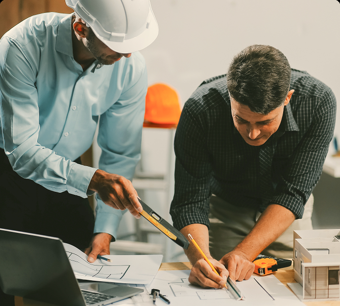 Young woman studying or working at desk with laptop
