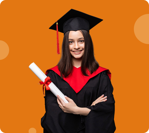 Female graduate in cap and gown smiling at camera