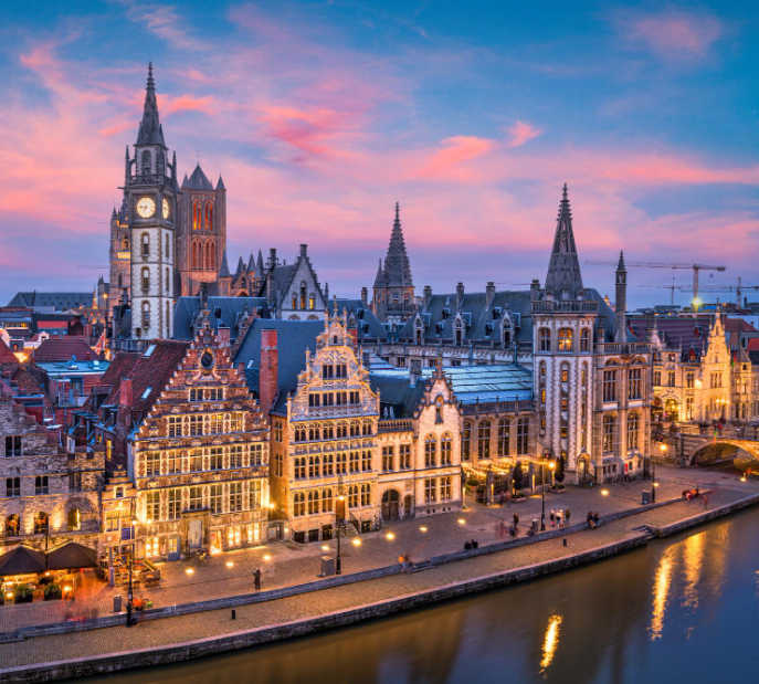 Krakow, Poland main square at twilight with historic architecture
