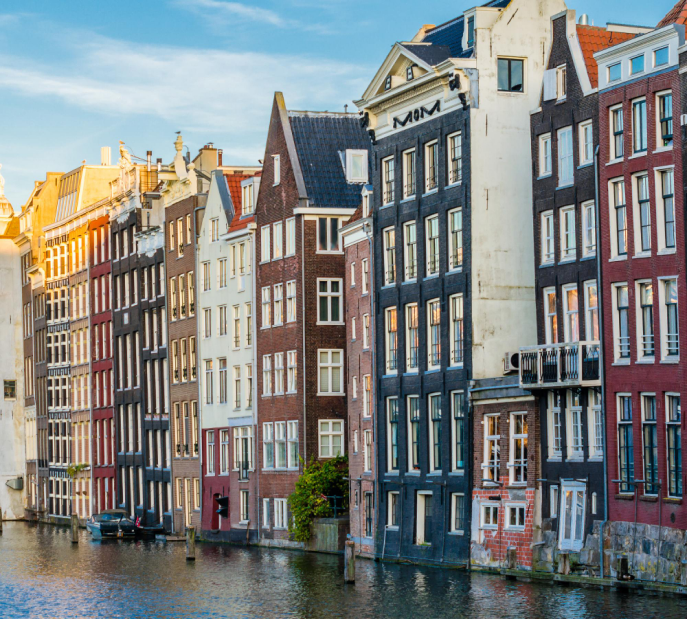Amsterdam canal houses with characteristic narrow architecture