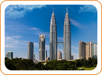 Petronas Twin Towers at night with illuminated facades